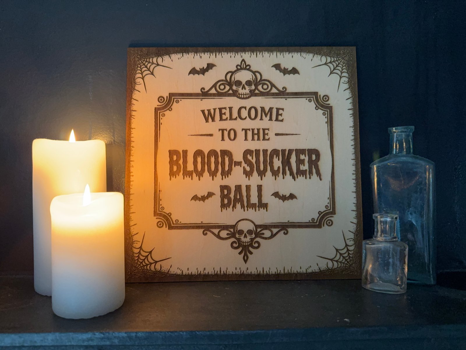 Welcome to the Blood-sucker Ball laser cut sign